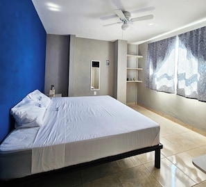 Economy Room, 1 Bedroom | Laptop workspace, blackout drapes, iron/ironing board, free WiFi - Sensity Home (Tehuacán)