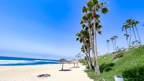 On the beach, sun-loungers, beach towels