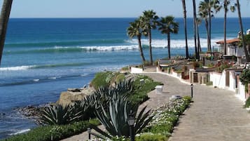 On the beach, sun loungers, beach towels
