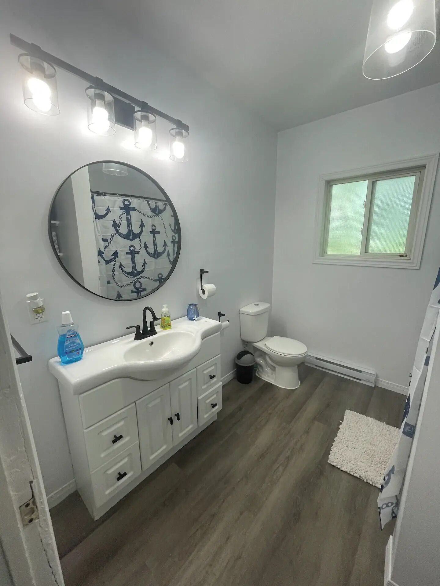 Shower, towels, soap, toilet paper