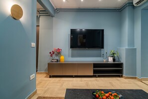 Luxury Apartment, 1 Queen Bed with Sofa bed, Non Smoking, Balcony | Living area | 49-inch Smart TV with cable channels, Netflix, streaming services - Lively Colors & Serene Comfort - Renovated 1BR by Piata Universitatii (Bucharest)