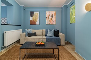 Luxury Apartment, 1 Queen Bed with Sofa bed, Non Smoking, Balcony | Living area | 49-inch Smart TV with cable channels, Netflix, streaming services - Lively Colors & Serene Comfort - Renovated 1BR by Piata Universitatii (Bucharest)