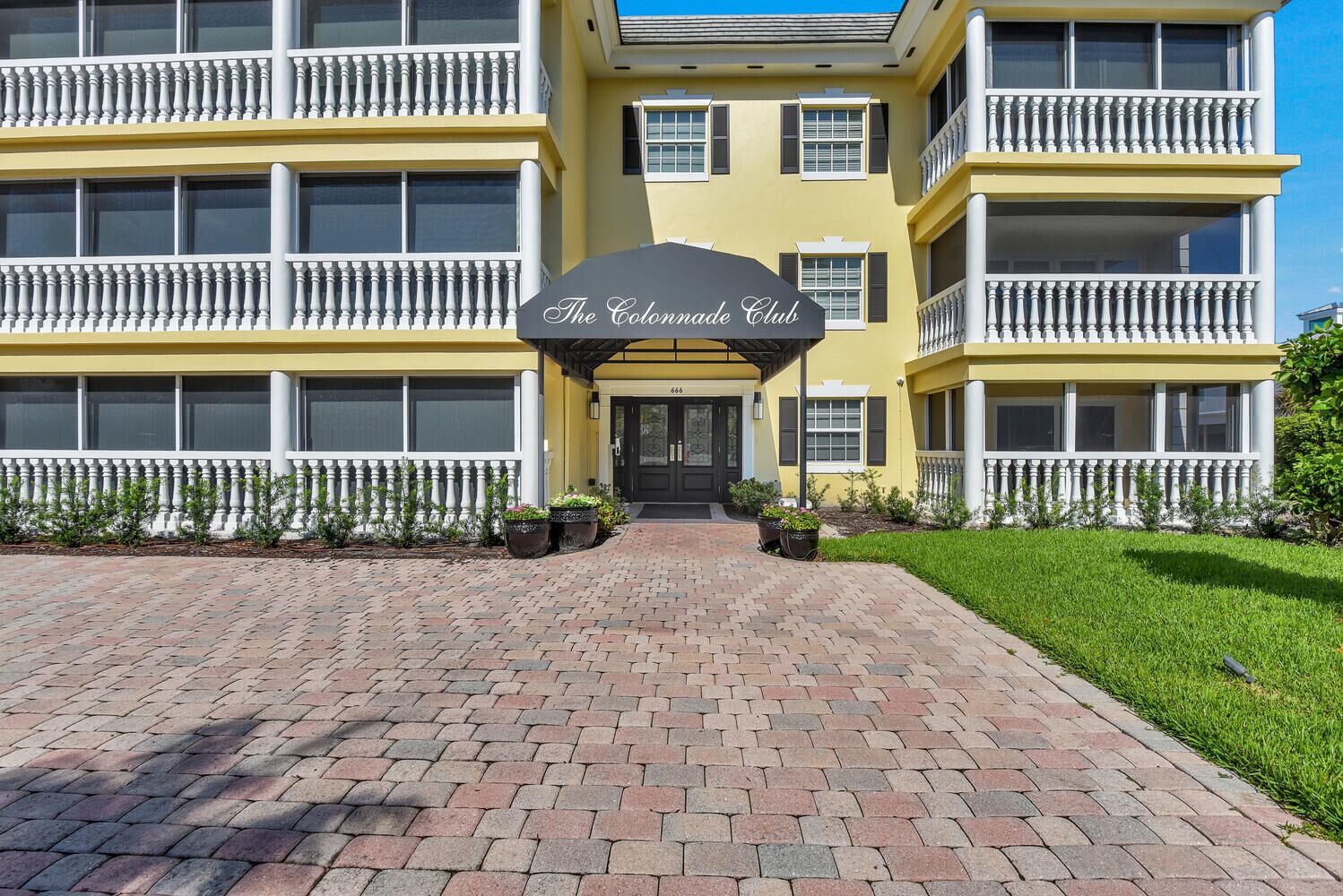 Experience the Best of Olde Naples Living at Colonnade Club 202!