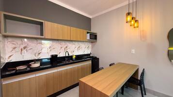 Family Quadruple Room, Pool View | Desk, laptop workspace, free WiFi, bed sheets