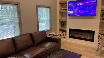 Smart TV, fireplace, books