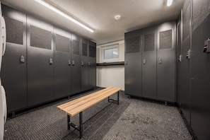 Guests can store their belongings in the lockers and sit on the bench.