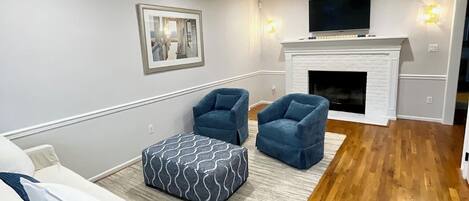 Smart TV, fireplace, books