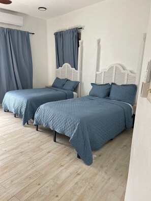 2 habitaciones, tabla de planchar con plancha, wifi y ropa de cama 