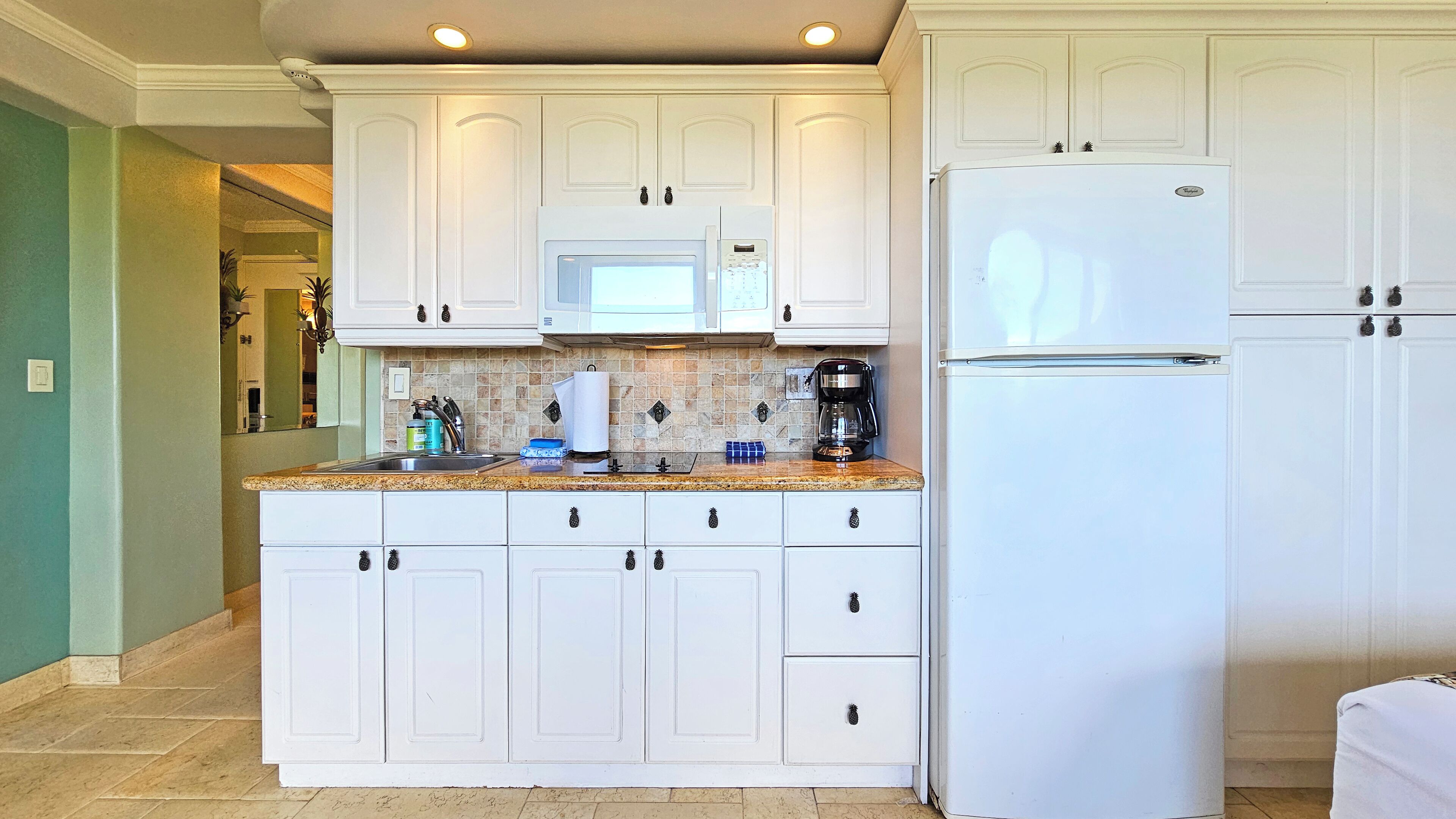 Fridge, microwave, stovetop, coffee/tea maker