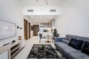 Comfort Apartment, Canal View | Living room | 50-cm Smart TV with digital channels - Binghatti Canal 1BR with view on Marina (Dubai)