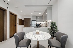 Comfort Apartment, Canal View | Living room | 50-cm Smart TV with digital channels - Binghatti Canal 1BR with view on Marina (Dubai)