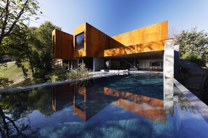 A modern building with a swimming pool in front. - NOT A HOTEL NASU (Otawara)