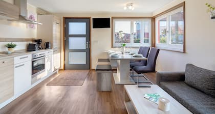 Maison de vacances 'Ferienhaus Rot' avec terrasse privée, jardin privé et Wi-Fi