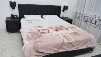 Deluxe Double Room, Garden View | Desk, laptop workspace, iron/ironing board, free cribs/infant beds