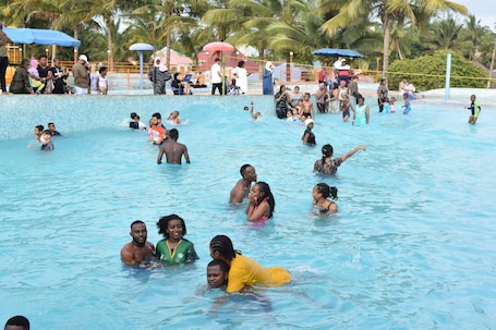 3 outdoor pools, pool umbrellas, lifeguards on site