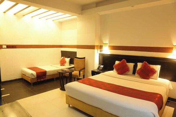 Executive Triple Room, Balcony, City View | Individually decorated, individually furnished, desk, laptop workspace