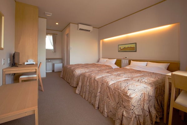 Desk, laptop workspace, free WiFi, bed sheets