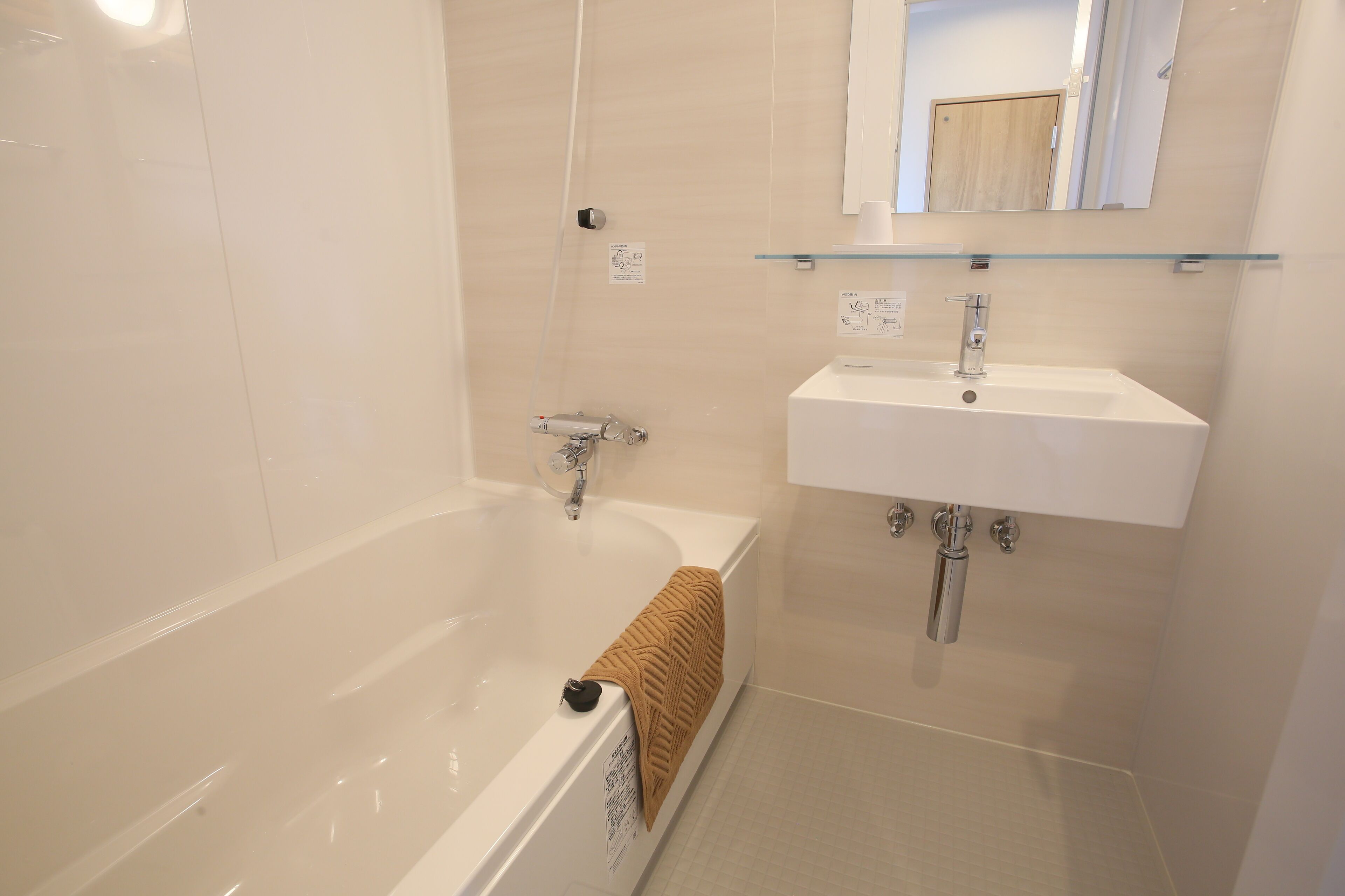 Hair dryer, towels, shampoo, toilet paper