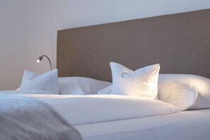 Premium bedding, down duvets, memory-foam beds, individually decorated