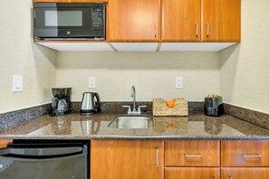 Coffee/tea maker, microwave, toaster, cookware/dishes/utensils