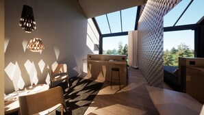 Een modern interieur met een groot raam, een bureau en een stoel.