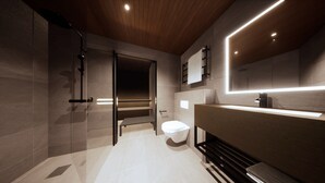 Een moderne badkamer met een douchecabine van glas, een toilet en een wastafel met spiegel.