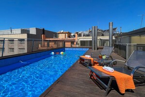 Outdoor pool, open 9:00 AM to 9:00 PM, sun loungers