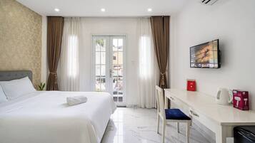 Ropa de cama de alta calidad, minibar y escritorio