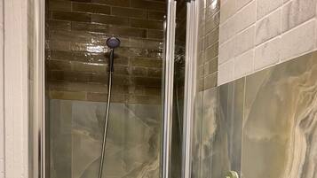 Shower, towels, soap, shampoo