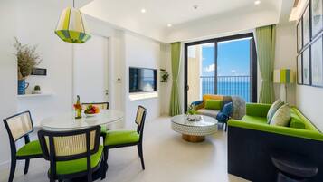 Basic Apartment, 2 Bedrooms, Partial Ocean View | Living room | Flat-screen TV