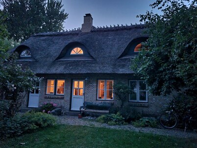 Cozy thatched cottage between the Baltic Sea and Schlei with a large garden