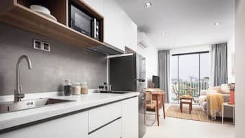 Full-sized fridge, microwave, stovetop, rice cooker