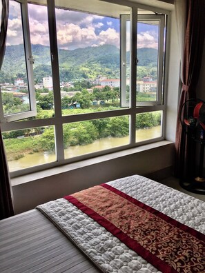 Standard Double Room, River View | Blackout drapes, soundproofing, iron/ironing board, free WiFi