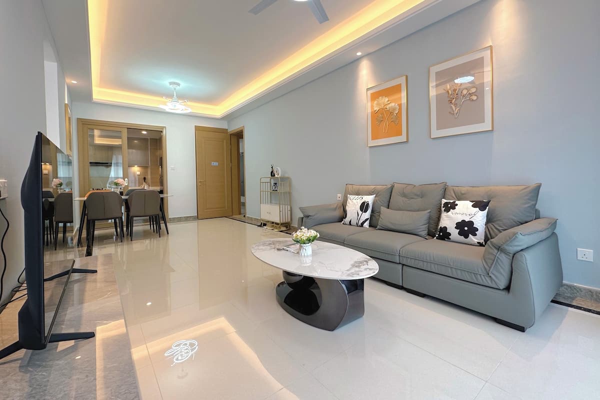 Luxury Condo, 2 Bedrooms, Non Smoking, Balcony | Living area | 50-inch Smart TV with cable channels, table tennis