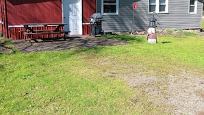 A two-story house with a red barn and a gray house. -  Farmhouse sleeps 2 -6  in the Allegheny National Forest outside Bradford Pa (Bradford)