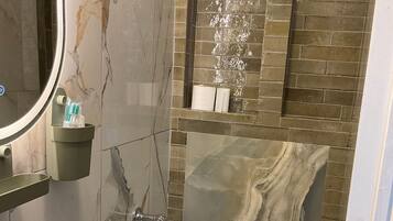 Shower, towels, soap, shampoo