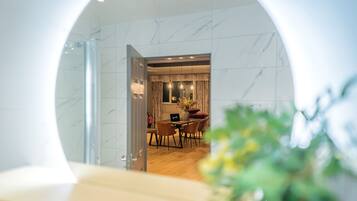 Deluxe Apartment, Non Smoking, Garden Area | Bathroom | Shower, hair dryer, towels, soap