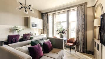 Deluxe Studio Suite, Non Smoking, Ground Floor | Living area | 50-inch Smart TV with digital channels