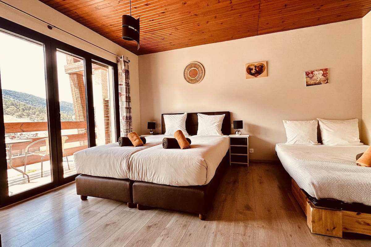 Family Quadruple Room, Balcony, Mountain View | In-room safe, blackout curtains, soundproofing