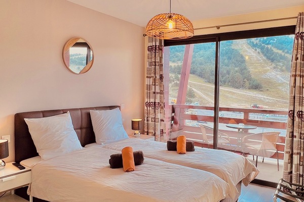 Standardværelse med 2 enkeltsenge - balkon - bjergudsigt | Pengeskab på værelset, mørklægningsgardiner, lydisolering