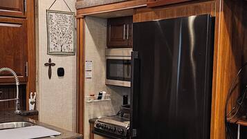 Fridge, microwave, coffee/tea maker, toaster