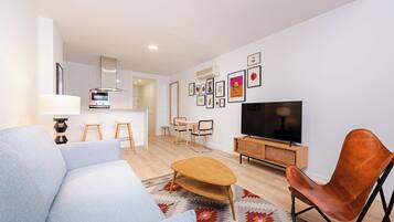 Studio, Non Smoking | Living area | TV