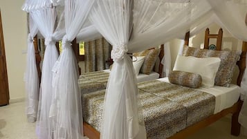 Deluxe Apartment, Balcony, Garden View | 2 bedrooms, individually decorated, individually furnished, free WiFi