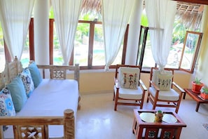 Appartement Luxe, balcon, vue jardin | Coin séjour