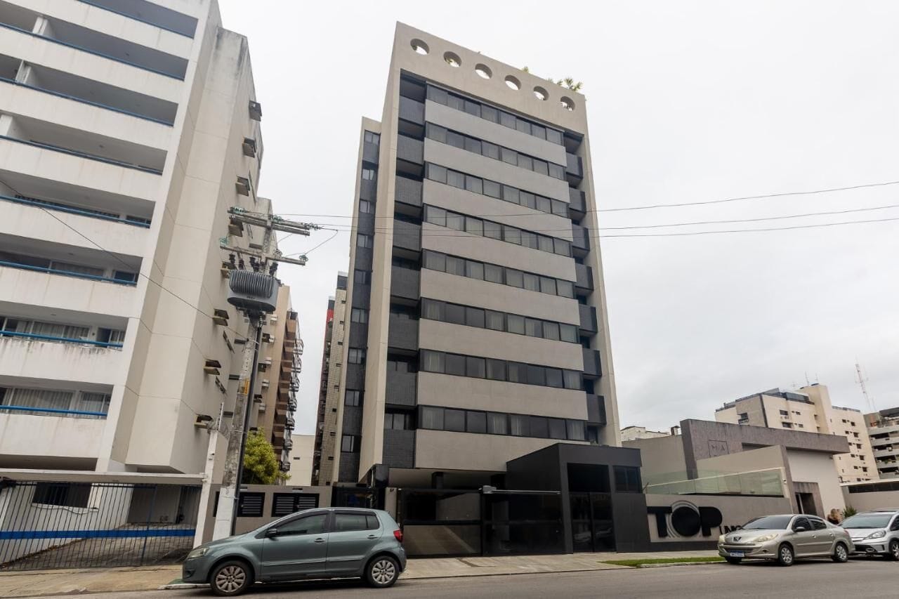 A modern building with multiple floors and a flat facade.