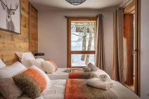 4 bedrooms, WiFi, bed sheets - Newly built duplex apartment with spa close to the village center (Les Gets)