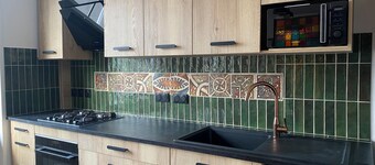 Maison du Cap Lihou, Duplex au 1er et 2ème étage mansardé d'une maison de ville 