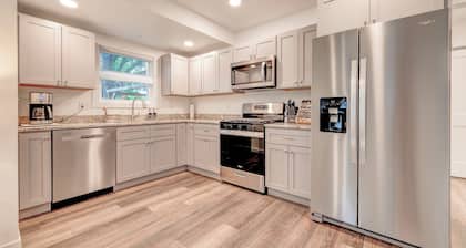 Modern Bungalow Retreat: Walk to Arnolds Park, Relax with Fire Pit & Pergola