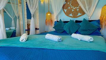Deluxe Suite, Sea View | 1 bedroom, in-room safe, individually decorated, free WiFi