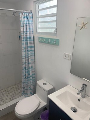 Shower, towels, soap, shampoo